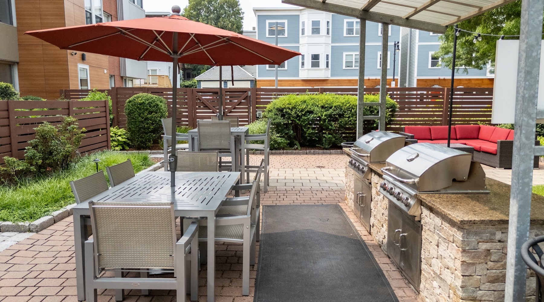 Grilling station and lush landscaping